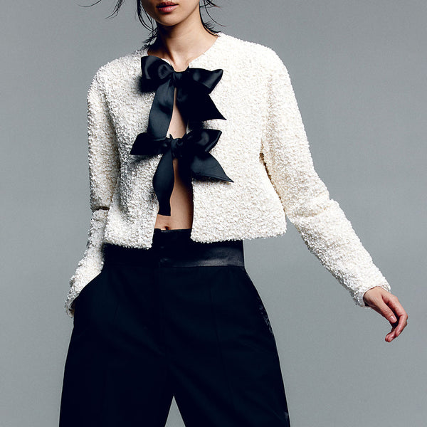 Bow tie with sales crew neck sweater