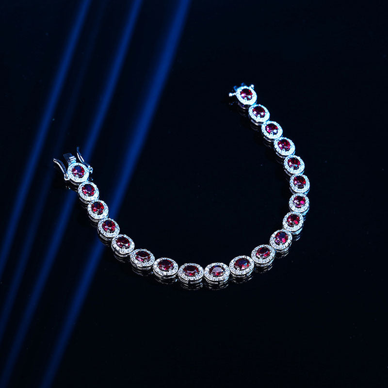 Alluring Rhodium Plated Sterling Silver Bezel Ruby Halo Tennis Bracelet