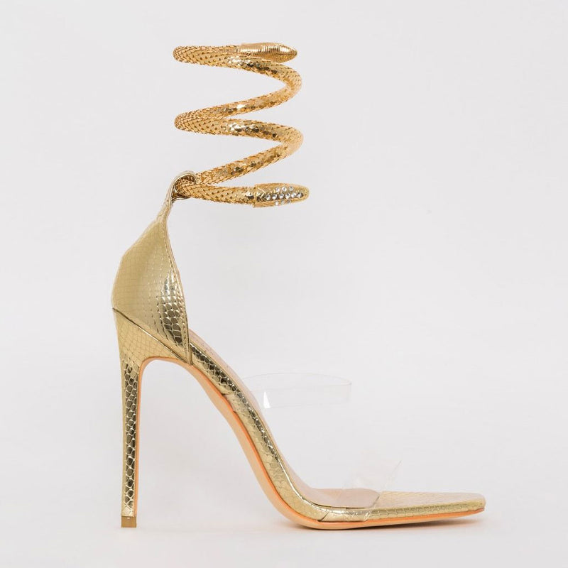 Gold high heels hi-res stock photography and images - Alamy